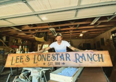 lee's lonestar ranch sign held by Matt