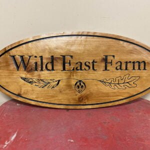 Oval Farm Sign with Feather Imagery